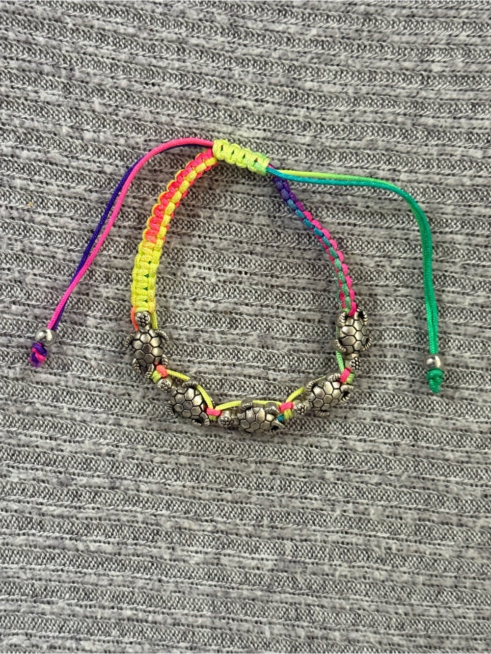 Beach theme braided rainbow colored cord adjustable bracelet